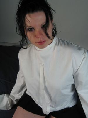 Teen in a white straitjacket