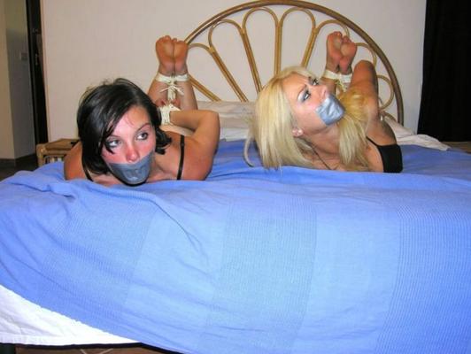 Two sexy girls bound in bed