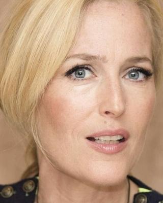 Gillian Anderson biting my penis till it bleeds.