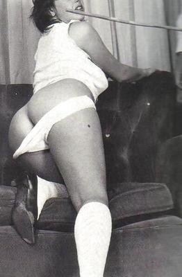 Black and white spanking-Curvy dark hair white panties and vest