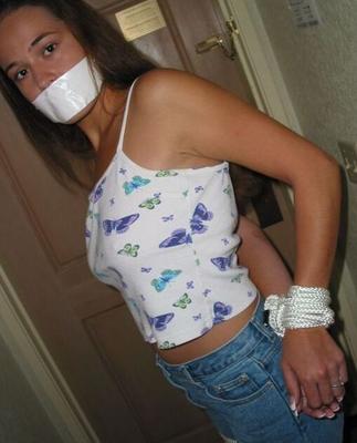 Sweet young woman bound and gagged