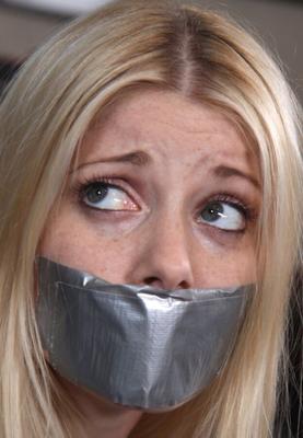 Woman in blue gagged