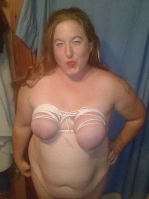 fat redhead whore. tied her saggy tits