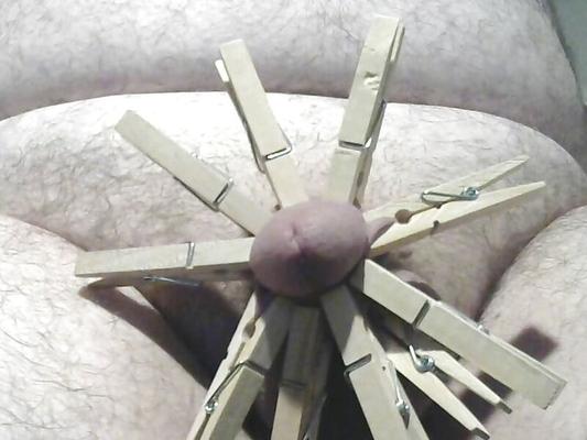 Cock and ball torture with clothespins