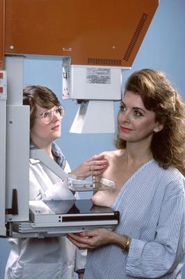 Mature American Brunette Lady Having A Mammogram