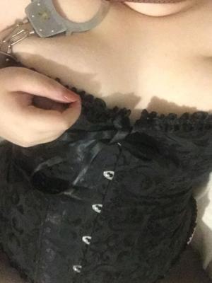 Slut in corset and bondage