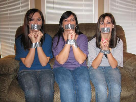 Bound and gagged mom and daughters up for auction!