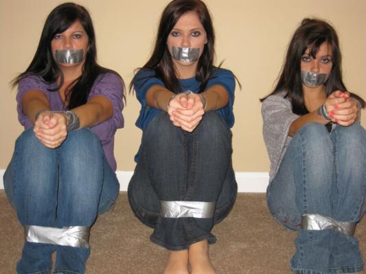 Mom and daughters gagged and taped up