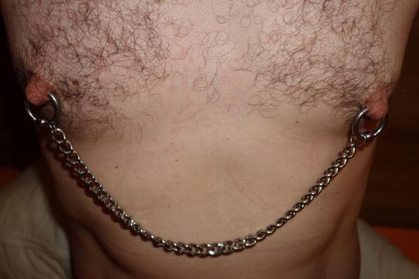 Huge chained nipple rings