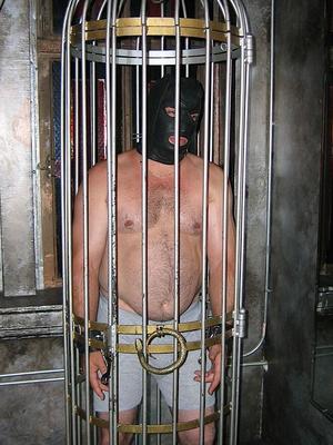 Caged male slave